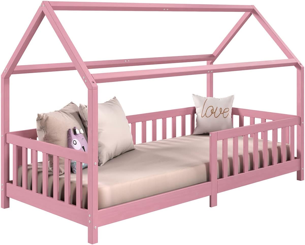 fotografia de uma cama montessoriana rosa